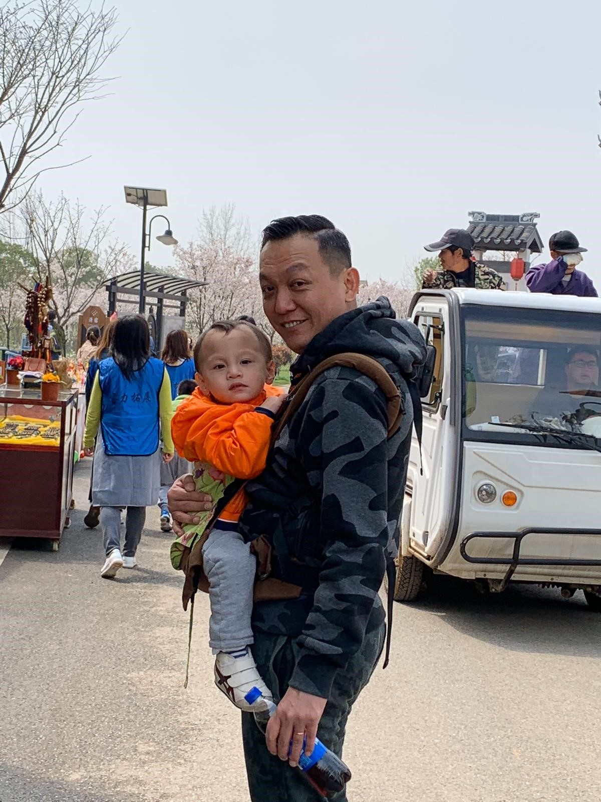 John with his 3yo old son in Wuhan
