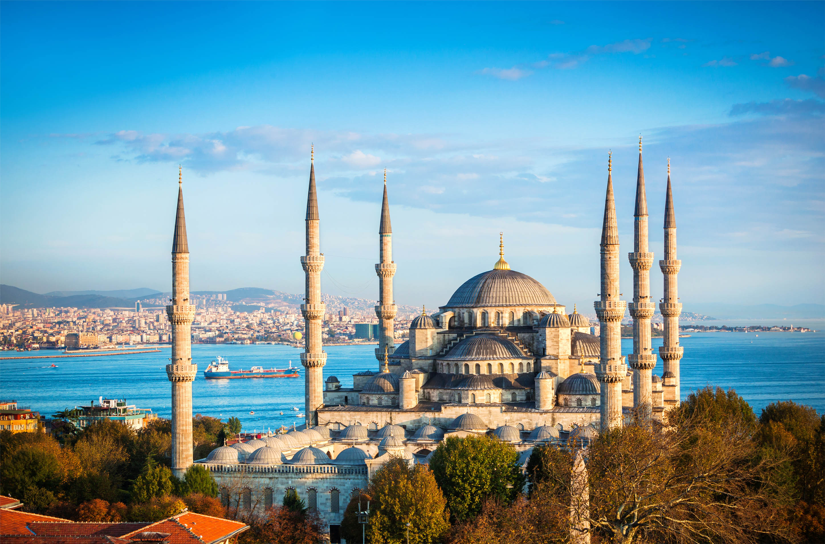 Only a short distance from your hotel in Istanbul, the Blue Mosque rises over the Bosphorus River.