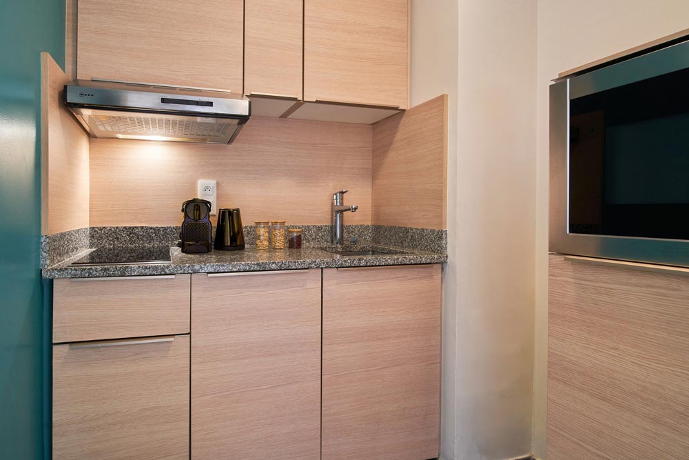 Kitchen of One Bed Apartment flat at Fraser Suites Harmonie in La Défense Paris