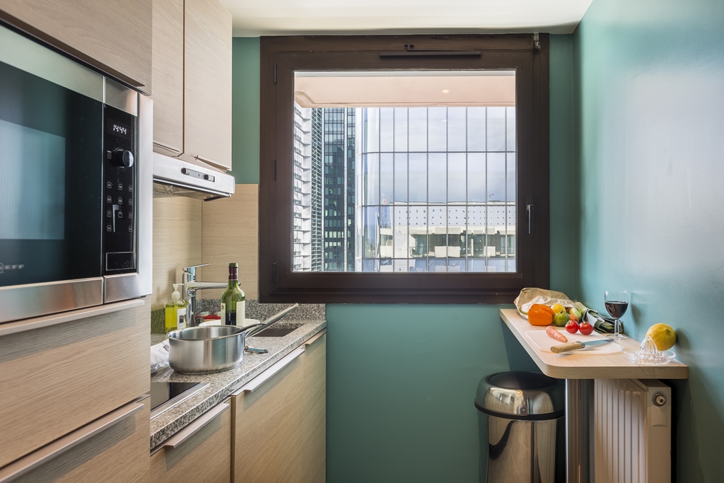 Family Friendly Room with baby cot at Fraser Suites Harmonie La Defense in Paris