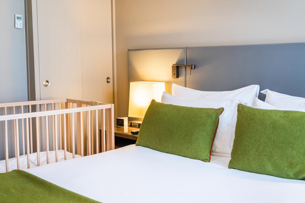 Family Friendly Room with baby cot at Fraser Suites Harmonie La Defense in Paris