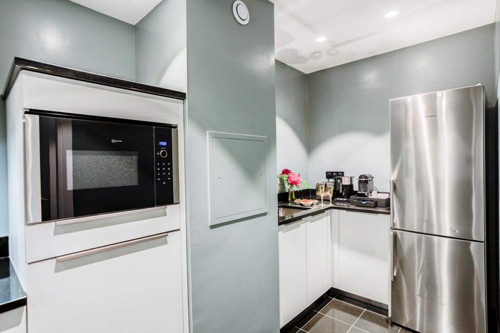 Fully equipped kitchen of the 2 Bed Executive Suite Apartment in Paris