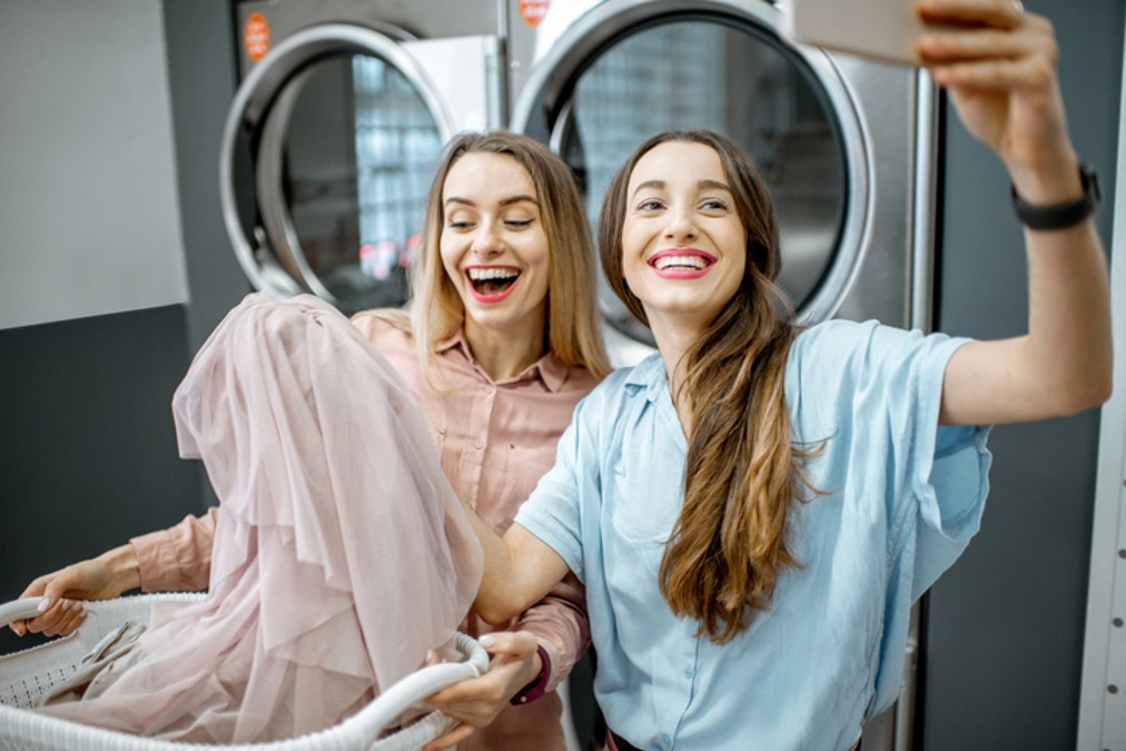 Guest doing self-service laundry at Capri by Fraser Frankfurt hotel