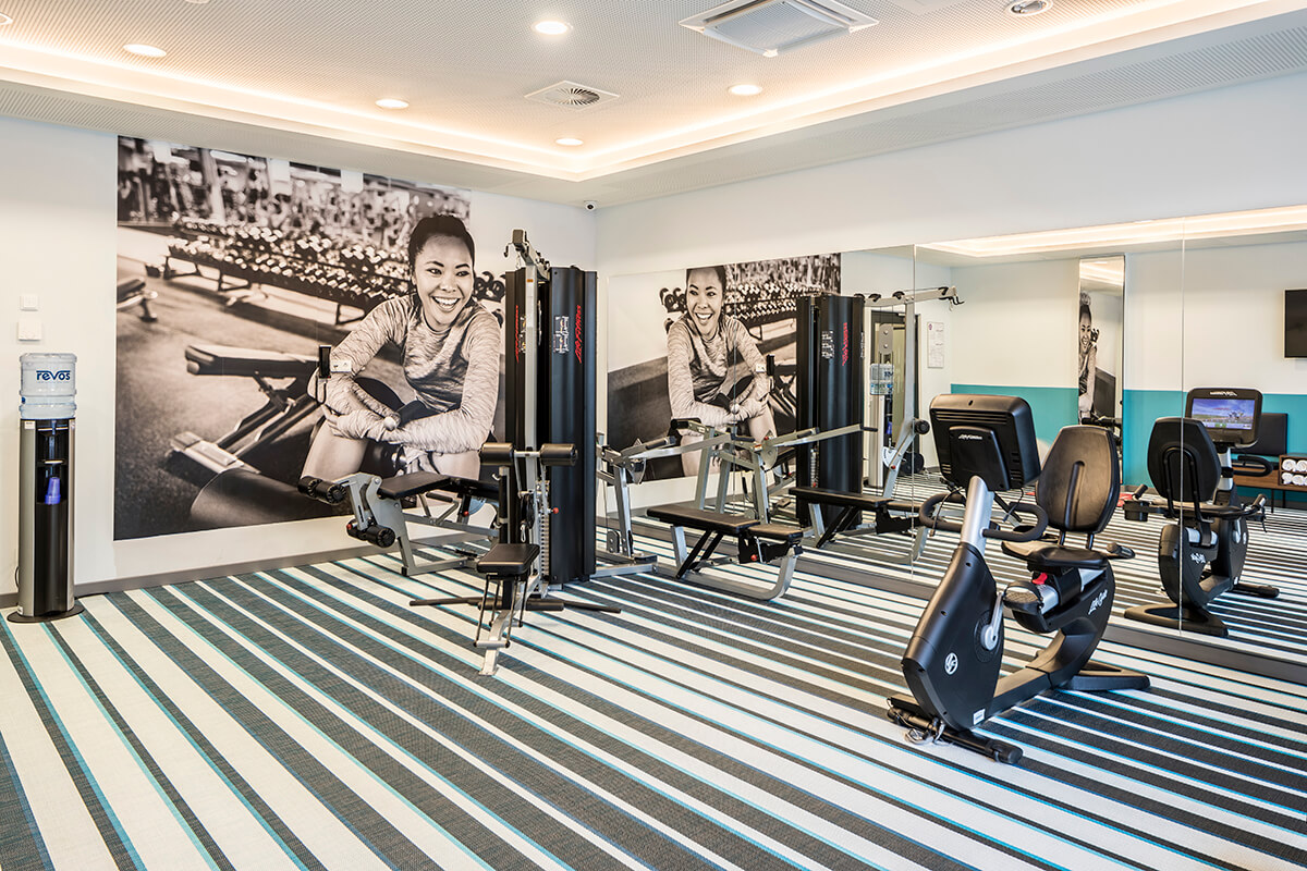 Overview of fitness room at Capri by Fraser hotel with gym in Frankfurt