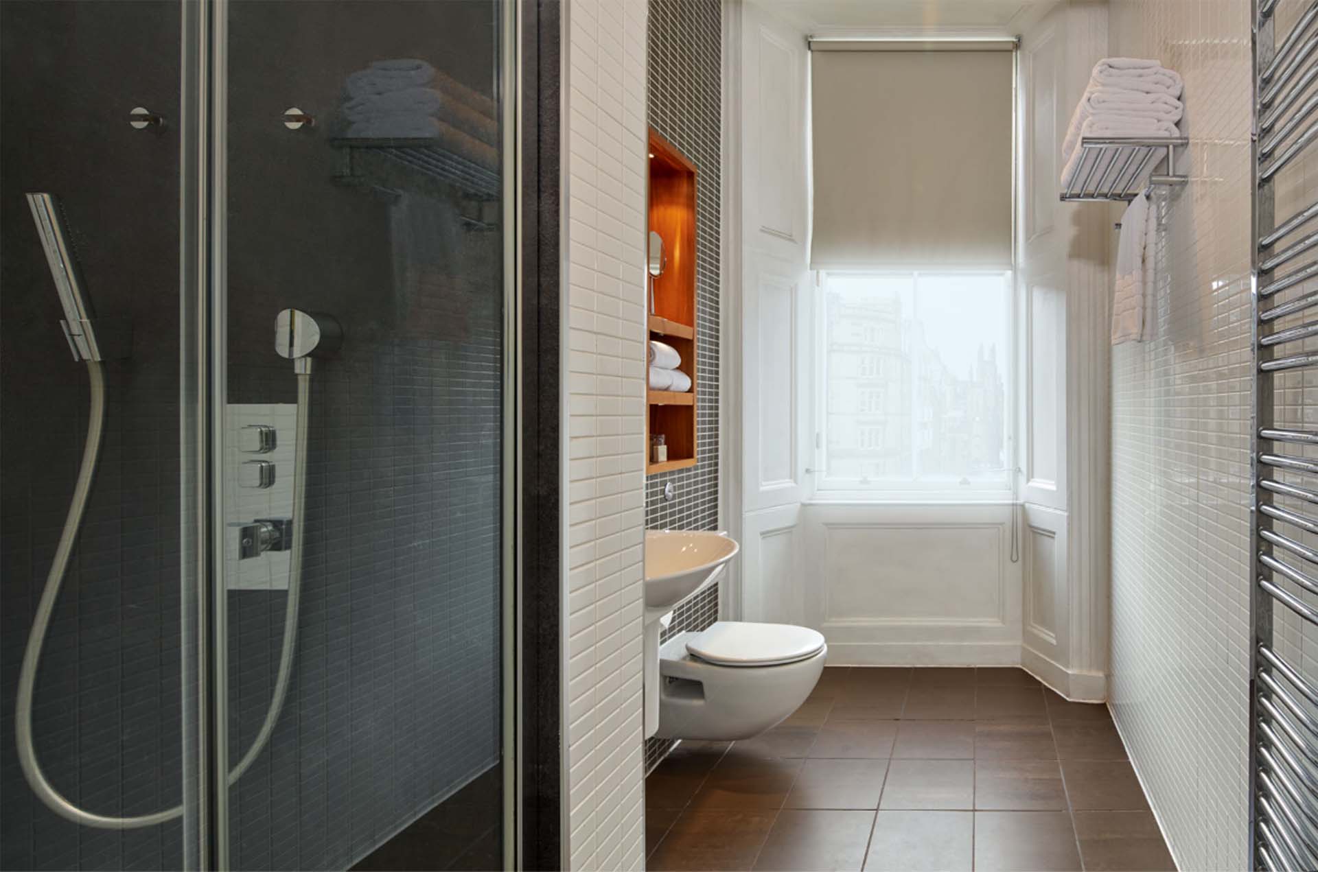 Ensuite bathroom at One Bedroom Deluxe Apartment in Edinburgh at Fraser Suites