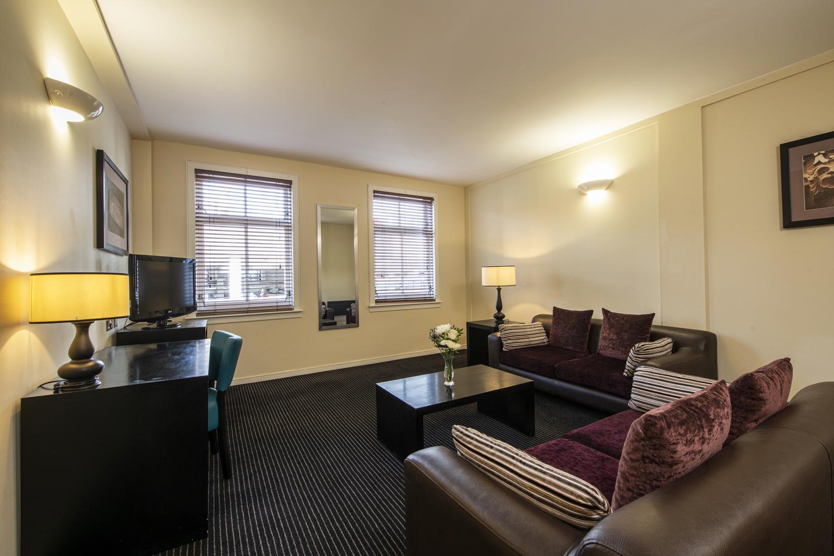 two bedroom deluxe apartment livingroom window fraser suites glasgow