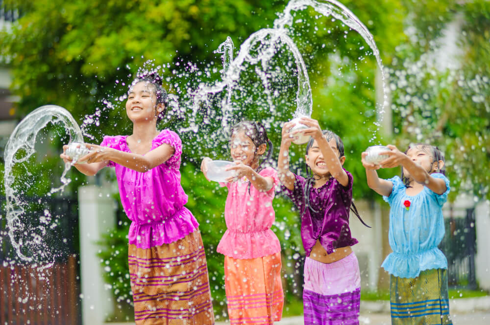 Children splashing water during Songkran