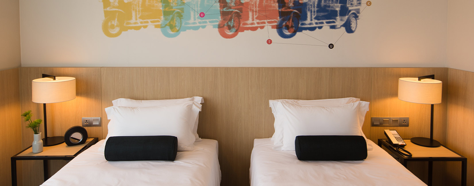 Deluxe single room with twin hotel beds at Modena by Fraser Bangkok near Asok