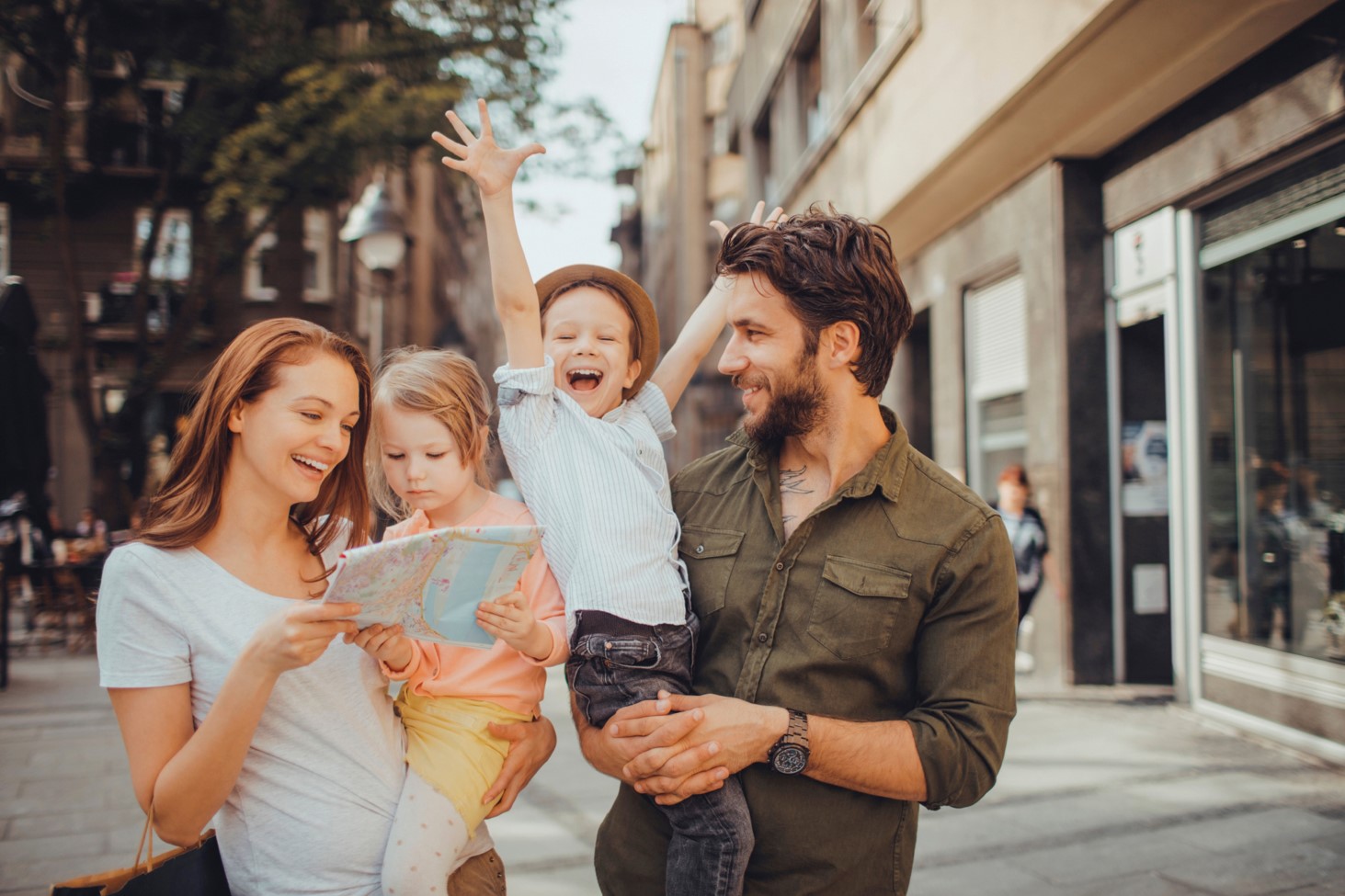 Parent with son sightseeing in Glasgow on a family breaks in Scotland