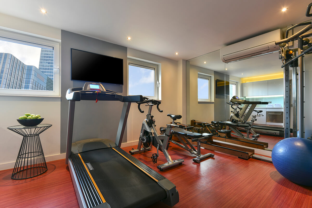Overview of gym room in Fraser Place Canary Wharf serviced apartments