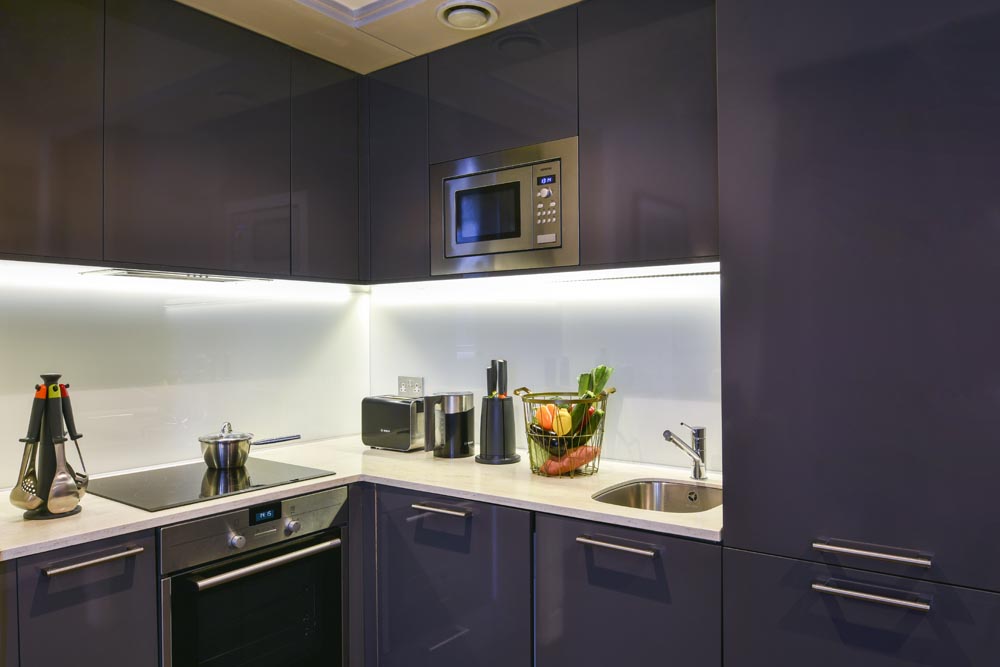 Kitchen of Two Bedroom Deluxe Apartment in London at Fraser Suites Queens Gate