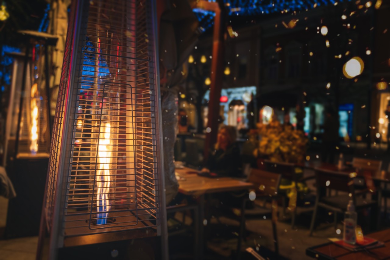 Street gas heater in street cafes in European city, lifestyle landscape and background