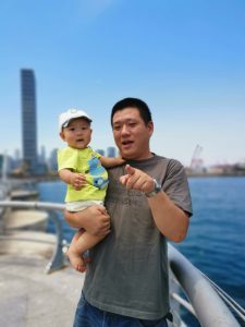 Yu Chao (Scott), security officer of Fraser Suites Dalian bonding with his baby daughter
