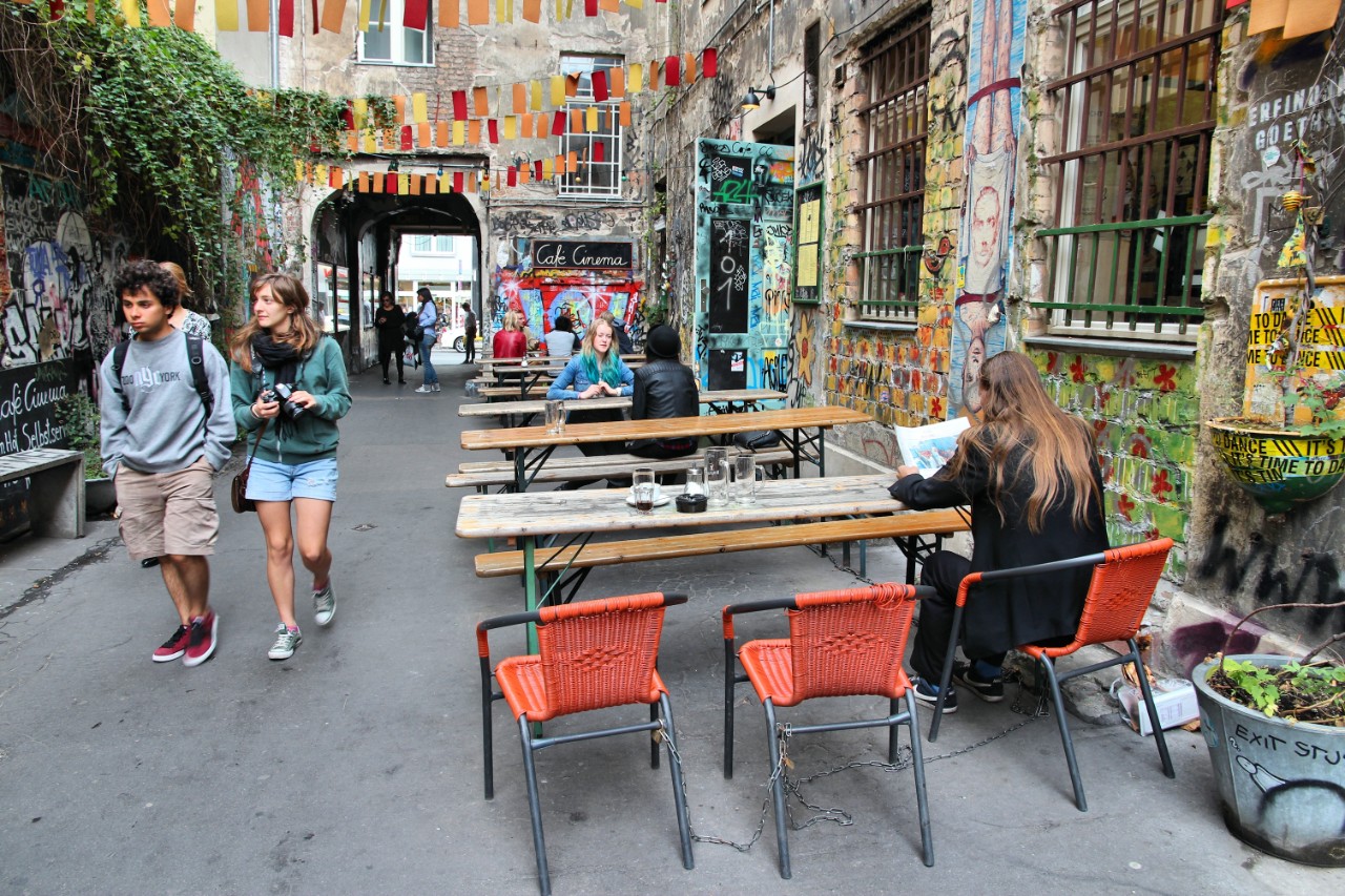 People visit old Hackesche Hofe in Berlin.