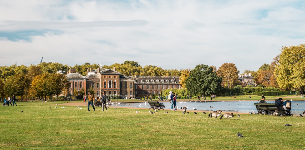 People are visiting Kensington Gardens outside of Kensington Palace