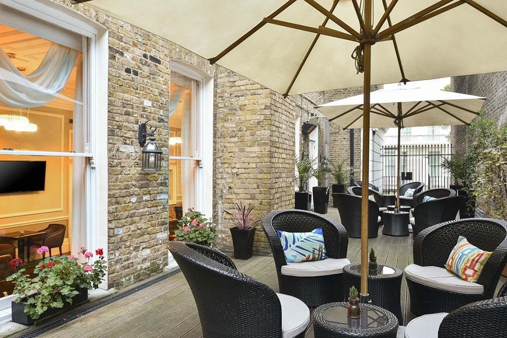 Outdoor patio at Fraser Suites Queens Gate, hotel with meeting room in Kensington, London