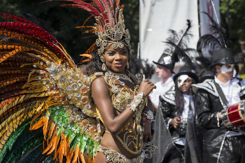 London, England, 26th August 2013: Beautiful Caribbean dancer takes part in the Notting Hill Carnival, annual event that is the largest in Europe.